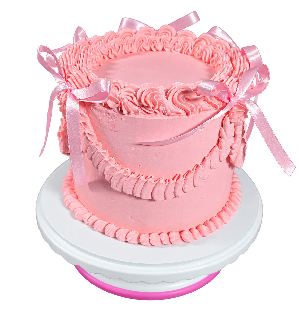 Pink celebration cake with piped buttercream and ribbon bows